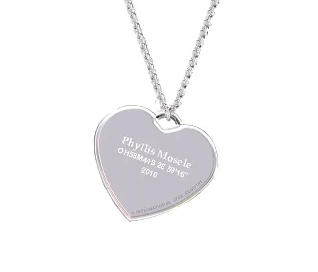 The star name engraved on a sterling silver heart-shaped charm with a simple, elegant silver chain.