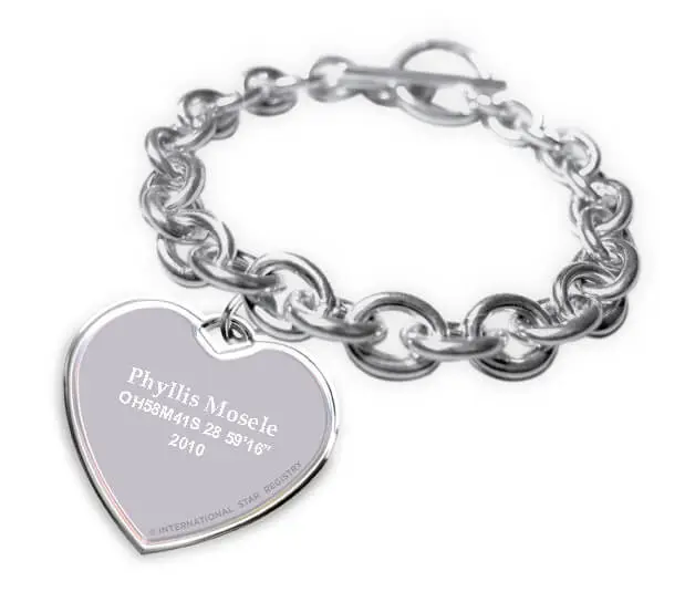 Tiffany-style sterling silver bracelet with heart shaped charm is engraved with the star name and telescopic coordinates 